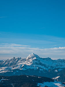aerial photography of glacier mountain under blue sky at daytime thumbnail