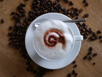 white ceramic mug on ceramic saucer thumbnail