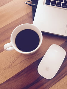 white ceramic teacup on brown surface thumbnail