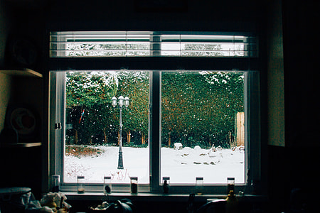 silhouette photography of windowpane during winter thumbnail