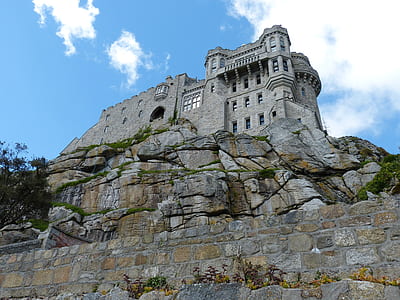 architectural photography of gray stone castle thumbnail