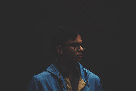 man wearing blue coat thumbnail
