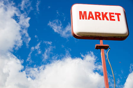 Market street sign over blue and white sky thumbnail