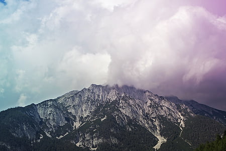 mountain under cloudy sky thumbnail