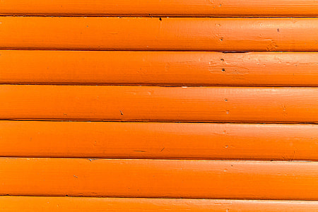 Close-up texture shot of bright orange wood panels. Image captured with a Canon DSLR thumbnail
