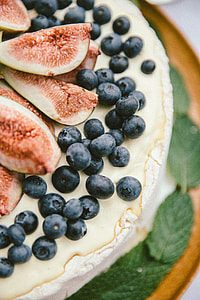blueberries beside brown and white sliced fruit thumbnail