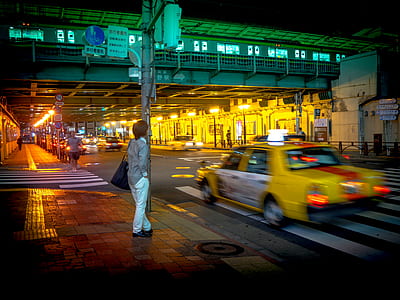 person wearing grey dress shirt standing on sidewalk thumbnail