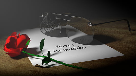 red roses and eyeglasses on white paper thumbnail