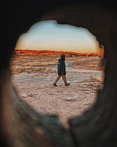 man walking on green grass thumbnail