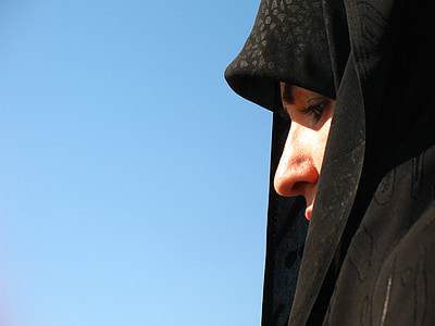 woman wearing black hijab headdress thumbnail