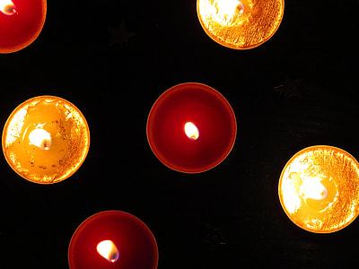 six assorted-color of lighted candles thumbnail