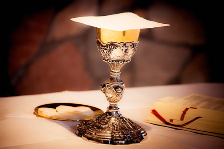 silver goblet on top of white surface thumbnail