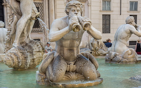 man blowing horn water fountain thumbnail