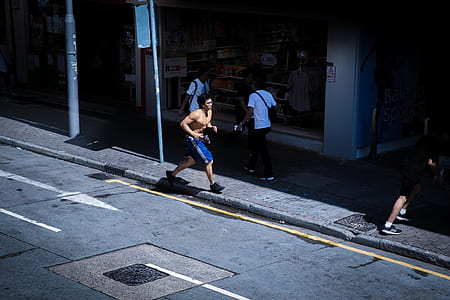 man running at the side walk thumbnail