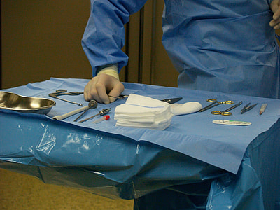 person standing near medical tools thumbnail