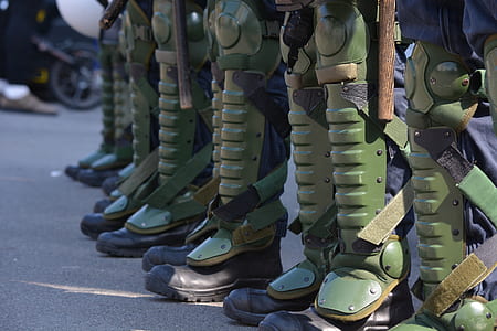group of person wearing green shin guards thumbnail