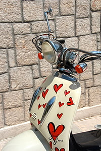 white and red motor scooter thumbnail