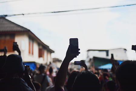people holding smartphone thumbnail