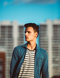 man posing for photo thumbnail