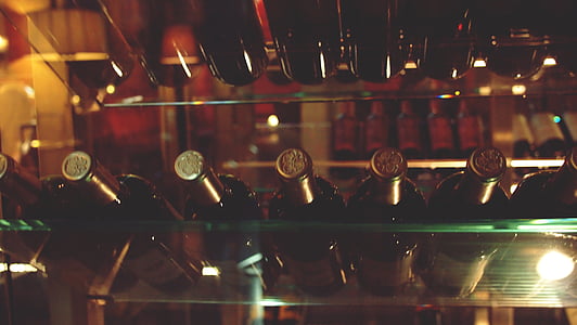 selective focus photography of bottles on shelf thumbnail