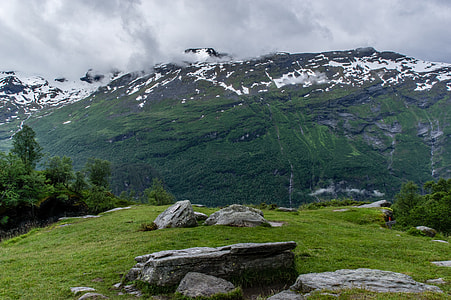 green mountain covered with snow during daytime thumbnail