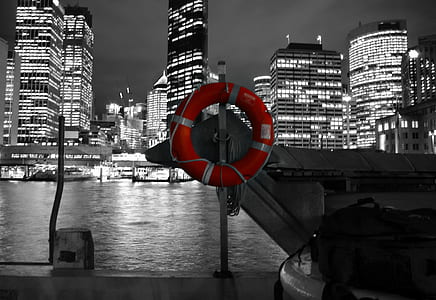 red and white inflatable swim ring thumbnail