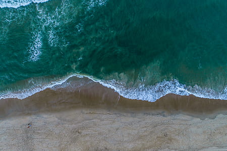 seashore near blue sea thumbnail