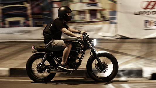 man ride-on black cruiser motorcycl thumbnail