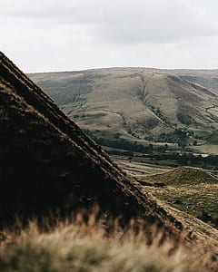 view of mountain covered with green grass under the clear sky thumbnail