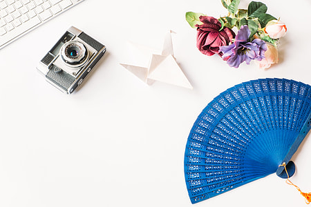 Styled photo with hand fan thumbnail