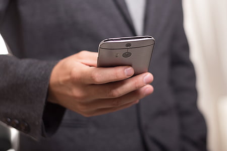 person holding gray Android smartphone thumbnail