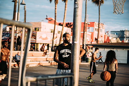 man playing basketball on coart thumbnail