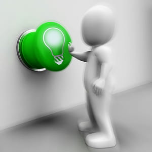 Light Bulb Pressed Showing Lit Up Or Bright Idea thumbnail