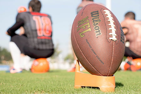 selective focus photography of Wilson NFL football thumbnail