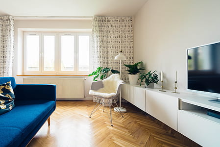 white flat screen TV on white table thumbnail
