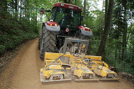 Truck pulling stuff through the woods thumbnail