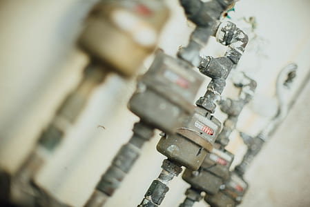 selective focus photography of brown metal water meters thumbnail