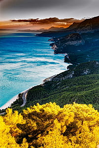 aerial photo of coastline near mountains thumbnail