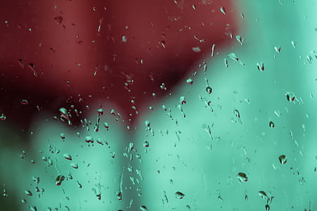 macro photograph of water dew drops on clear panel thumbnail