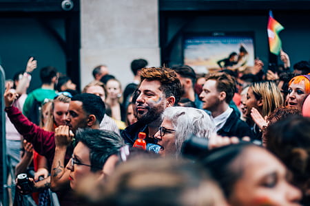 group of people standing outside during daytime thumbnail