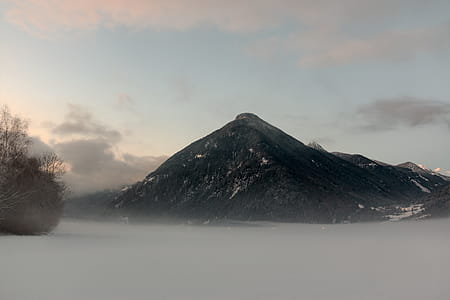 Black Mountain Under Cloudy Sky thumbnail
