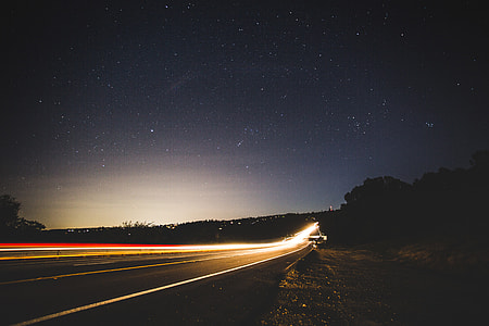 Lighted highway under the stars at Forest Hill Bridge, California thumbnail