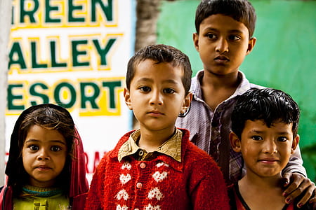 four children taking photo thumbnail