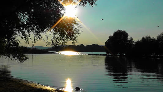 sunset over the horizon thumbnail