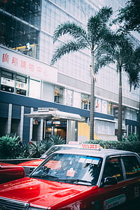 taxi cab in front of building thumbnail
