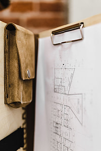 Architecture plans in an elegant leather bag thumbnail
