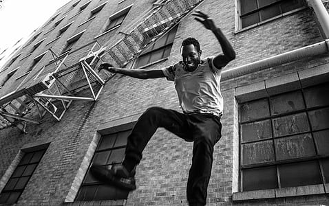 man wearing black pants jumping thumbnail