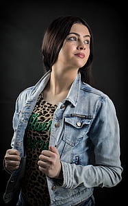 woman holding chambray jacket thumbnail