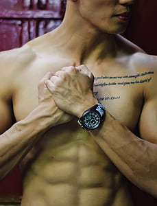 person wearing black sports watch thumbnail