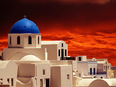 beige concrete houses under red sky thumbnail